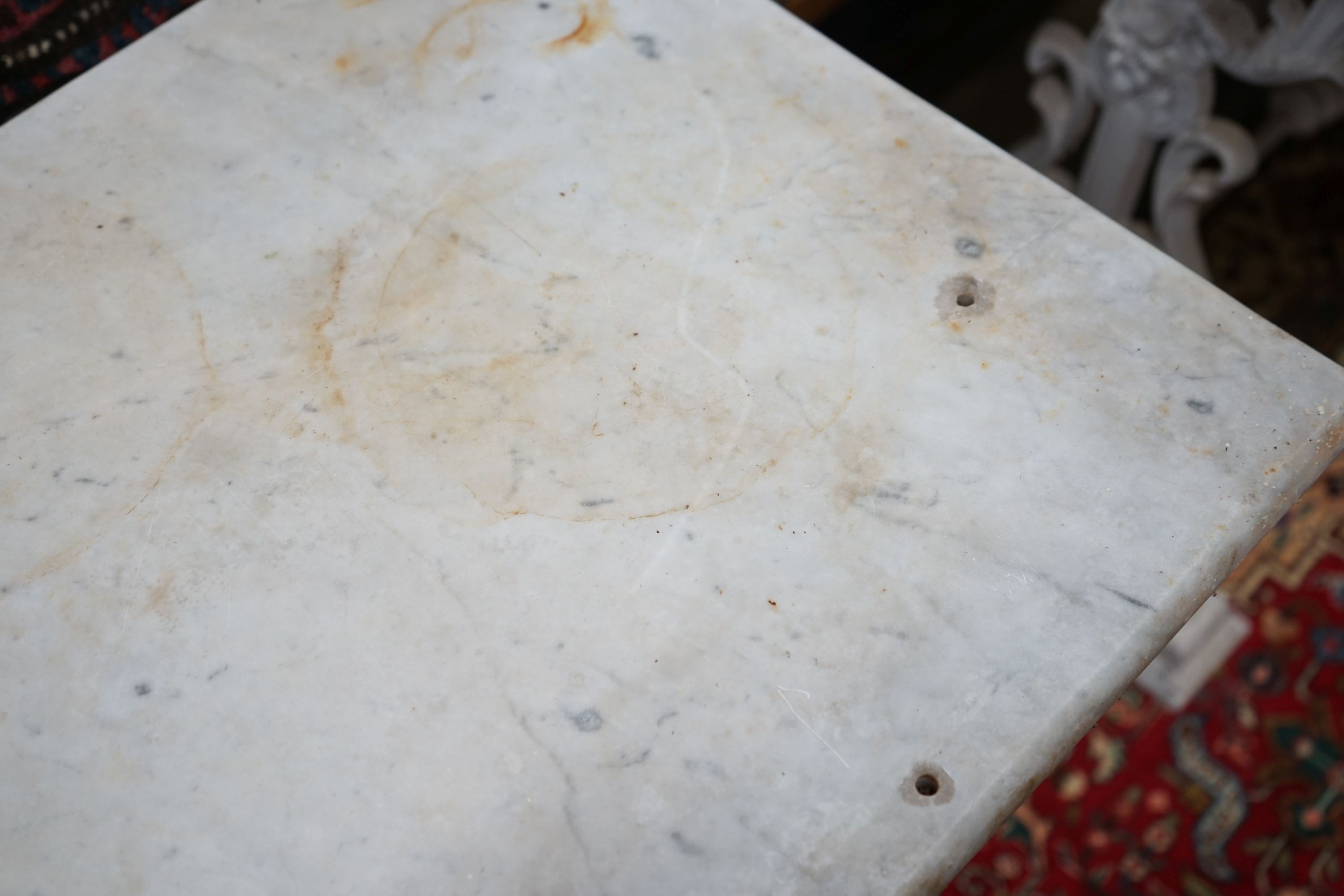 A Victorian cast iron rectangular marble topped garden table, width 97cm, depth 46cm, height 75cm